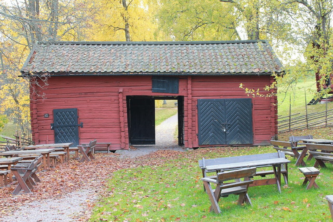 Why barns are traditionally painted red?